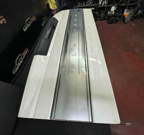 white OEM tailgate for a 2017–2022 Ford F-250 or F-350 Platinum truck