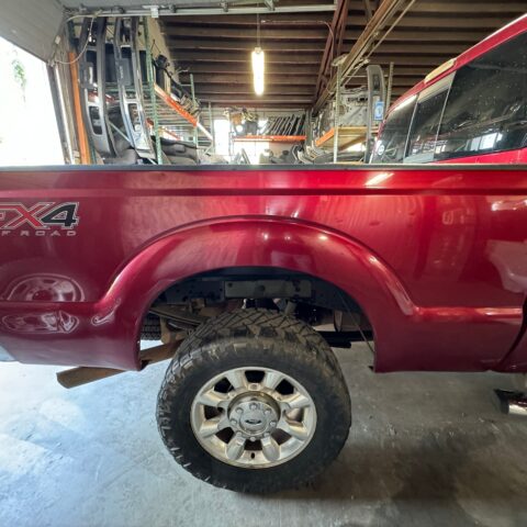11-16 Superduty Short bed 6’9” Ruby Red #1076 - product photo 1